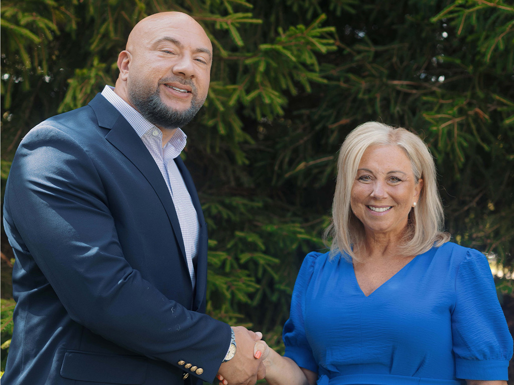 Tom & Fran Handshake-ls.jpg